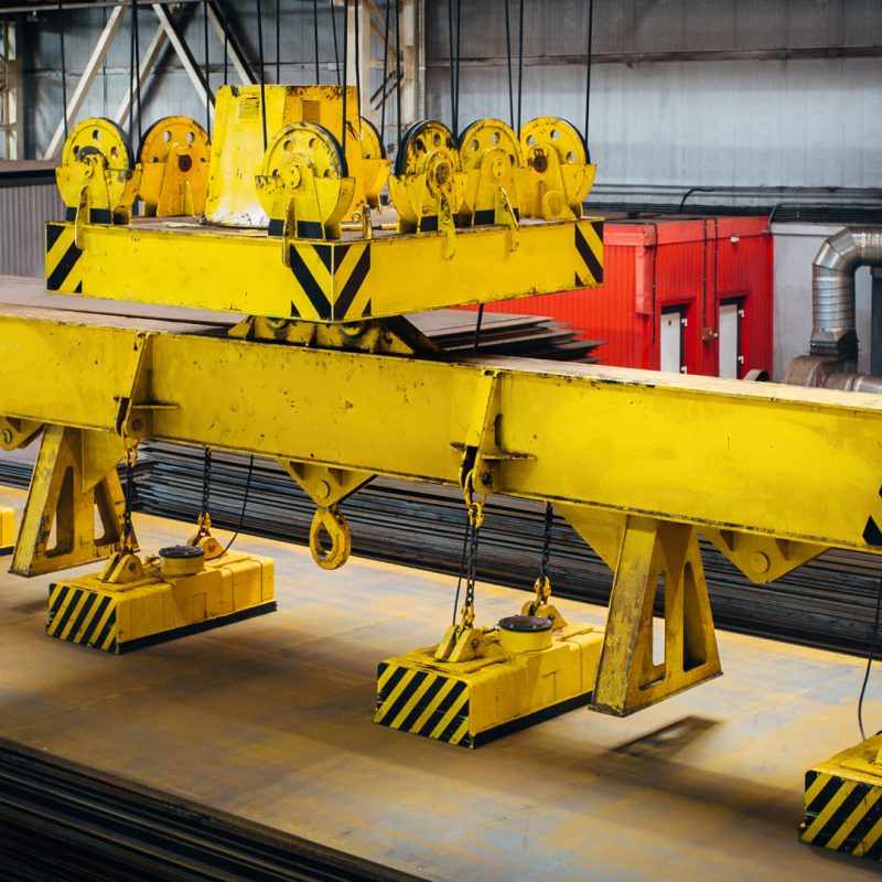 Industrial magnetic grippers lifting steel sheets