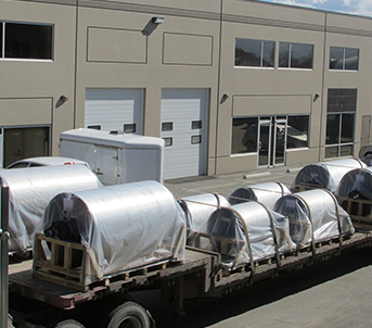 Large magnets loaded onto a trailer.